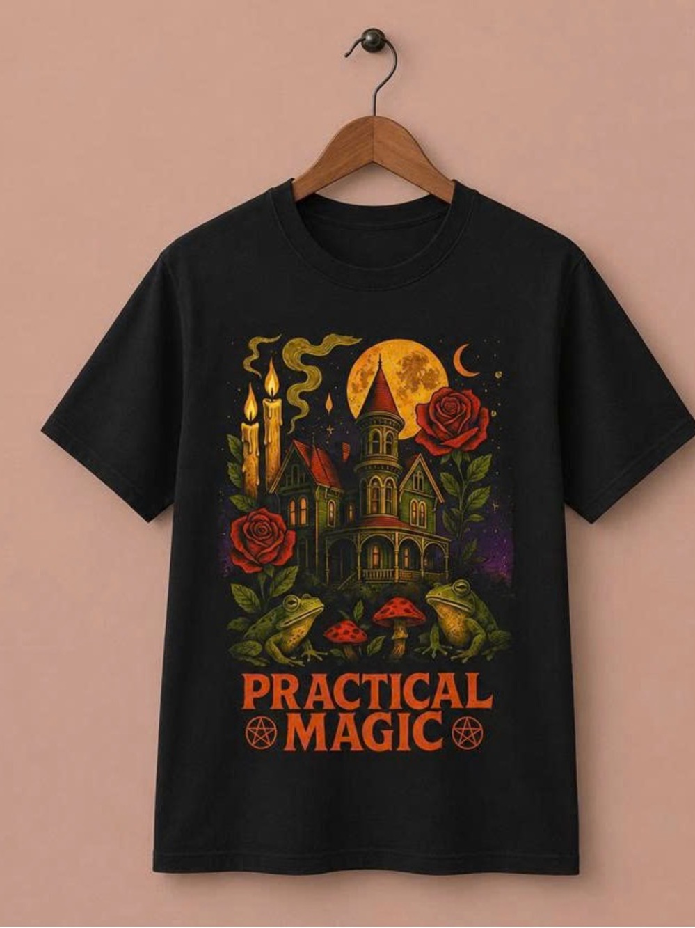 Practical Magic Black Graphic Tee with Orange and Green Print